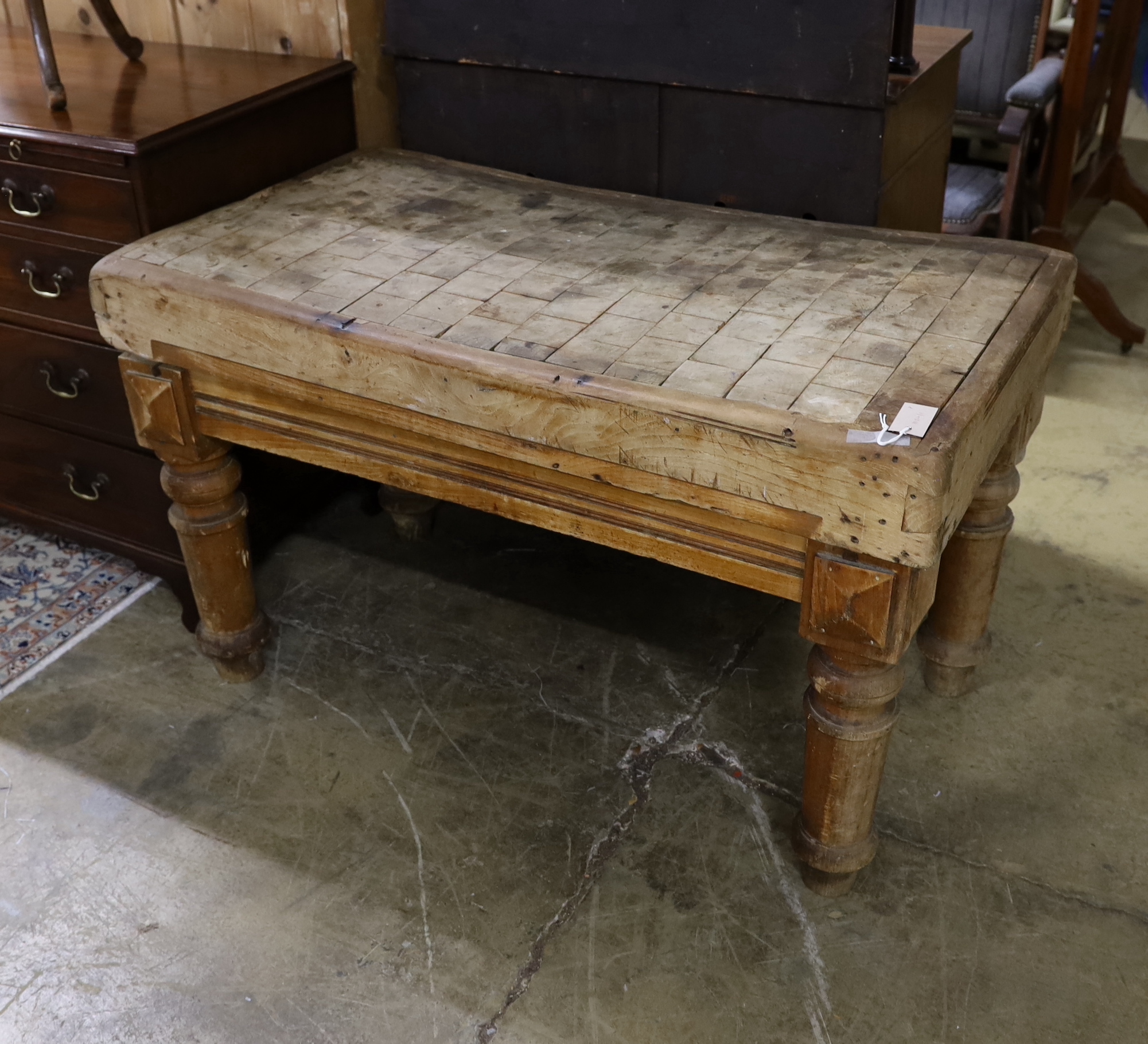 A Victorian rectangular pine and fruitwood butcher's block on stand, width 115cm, depth 65cm, height 71cm